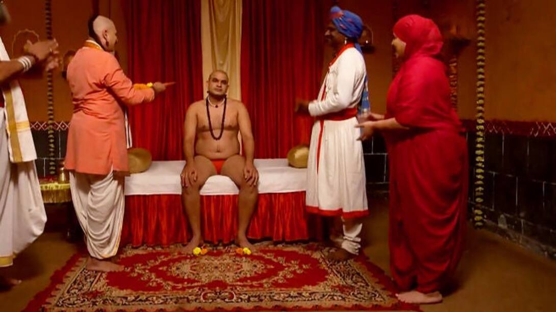 The disciples worship Swami