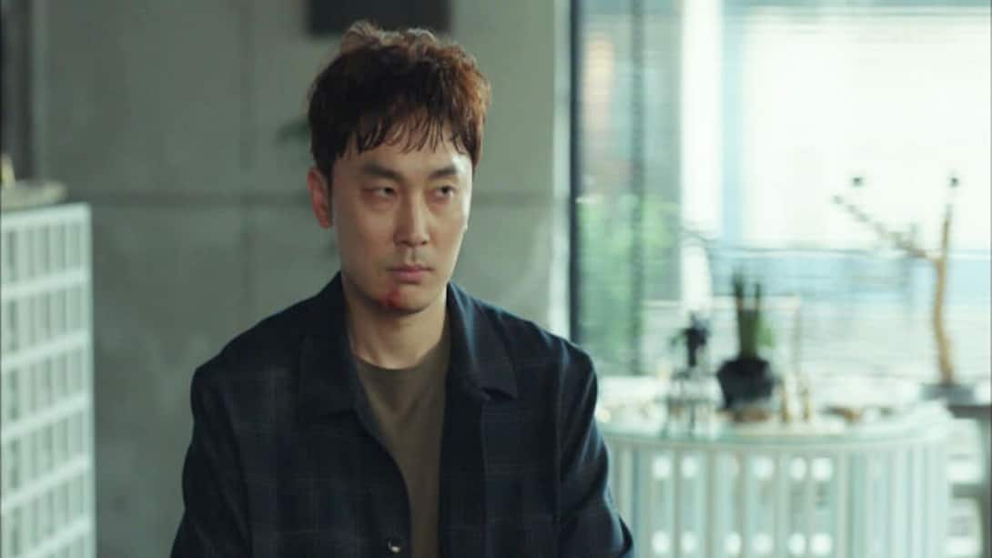 Kim Moo-Jin is interrogated