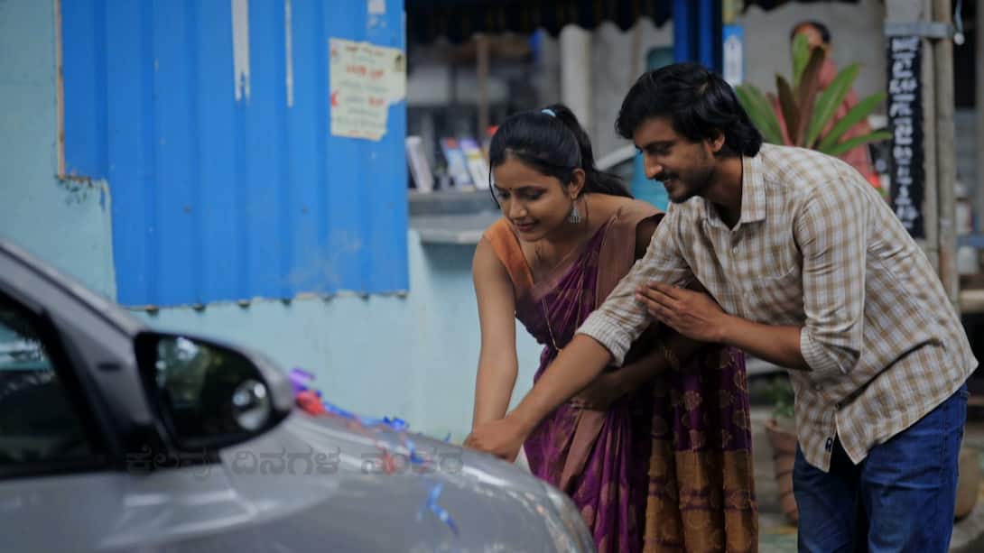 Vasudha gifts her husband a car
