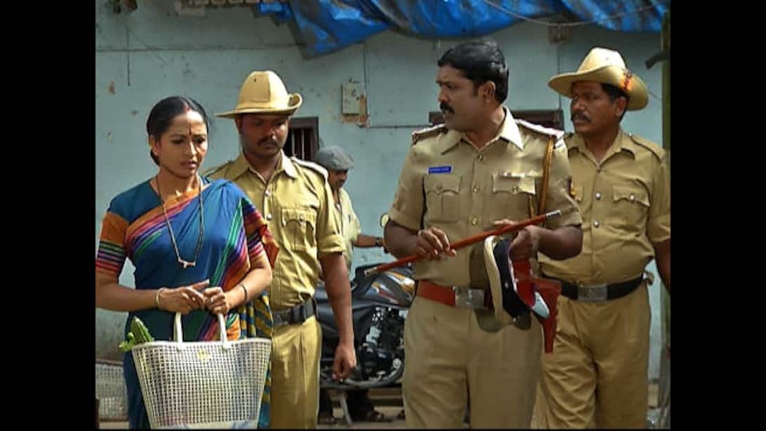 Radha gifts a sari to Ashwini