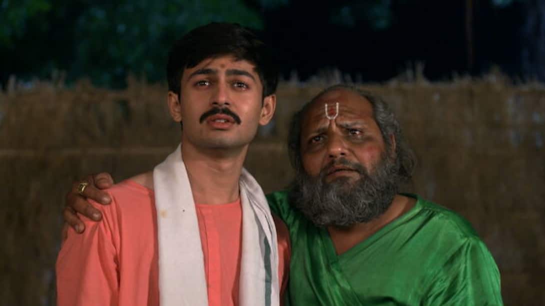 Poojari Ji takes Gora in the temple