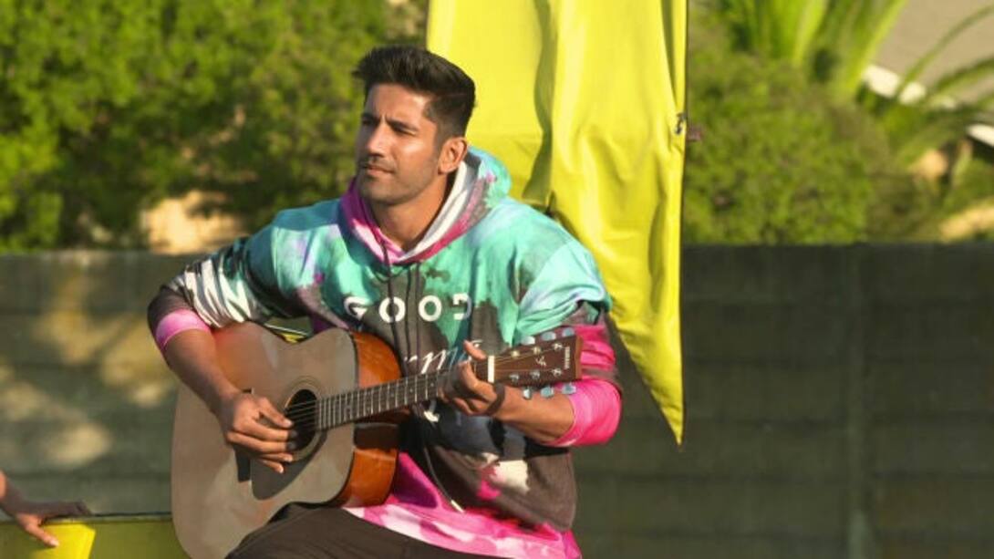 Varun plays the guitar