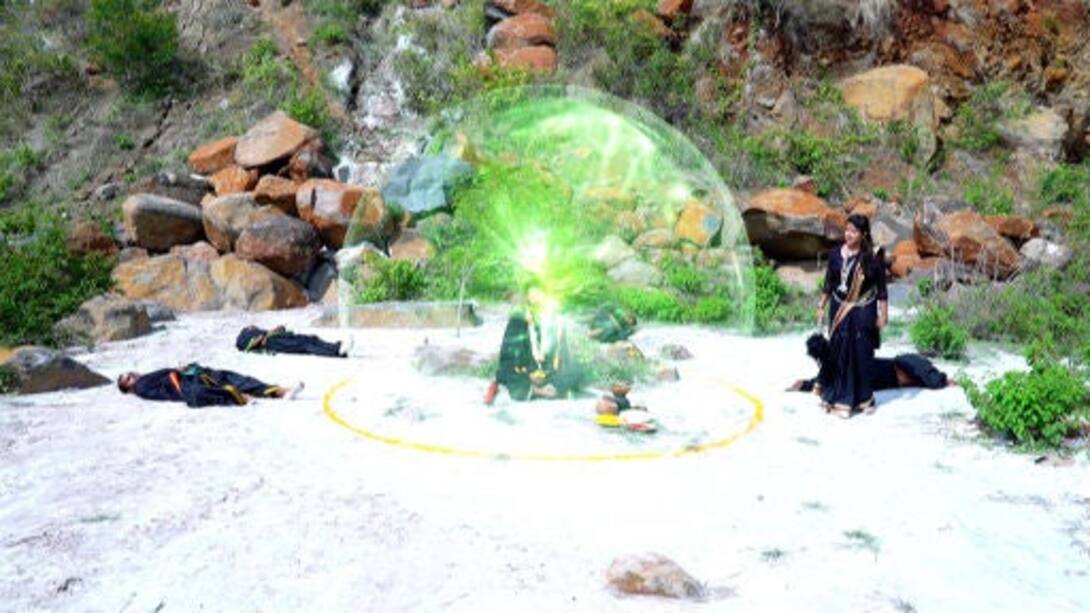 Senani creates a force field around Rishaba
