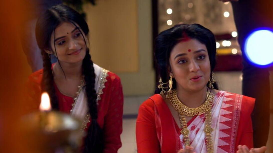 Durga and Tara doing lakhsmi puja