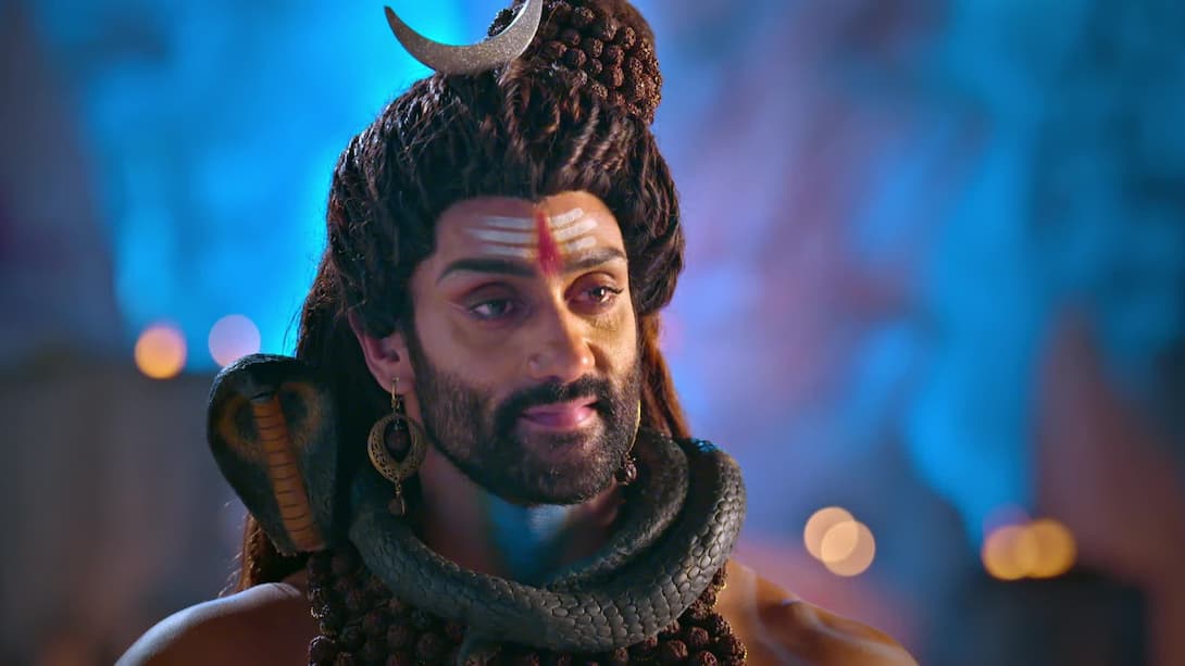Lord Shiva guides Kartikeya